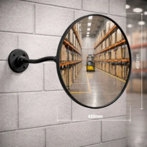 450mm Vista Flex indoor convex mirror mounted on a warehouse wall with adjustable arm and wall plate, showing warehouse aisle reflection and size dimensions