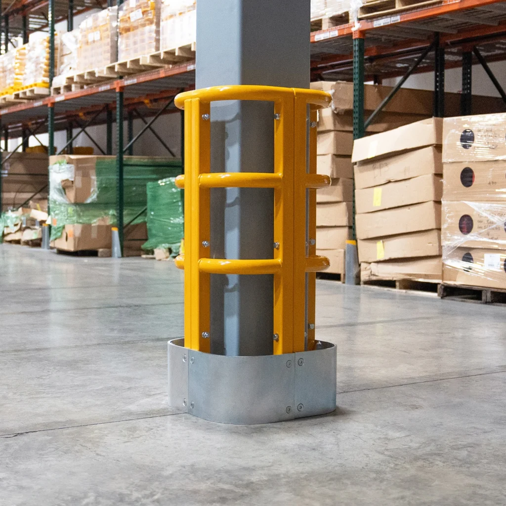 High-visibility warehouse column protector installed around an exposed column to reduce forklift impact damage.
