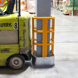 High-visibility warehouse column protector installed around an exposed column to reduce forklift impact damage. Forklift touching protection